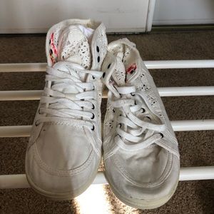High-top ivory colored Roxy Women’s shoes.